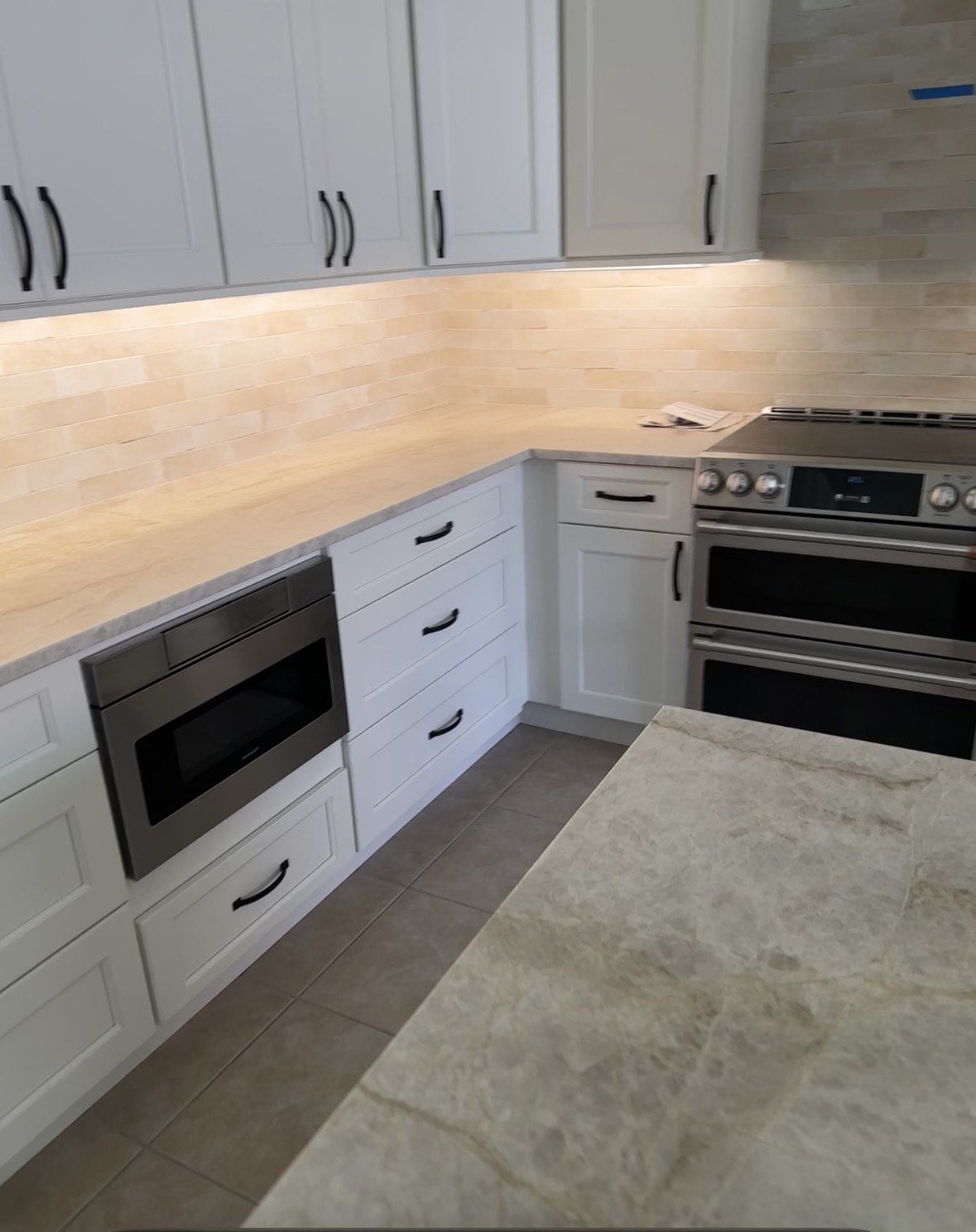 Built-in wall cabinetry with finished trim